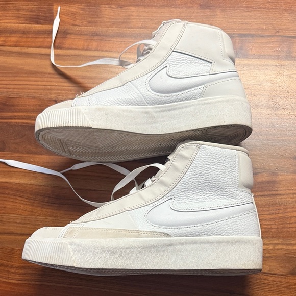 Nike Shoes - Nike White High-Top Sneakers Women’s 10/Mens 8